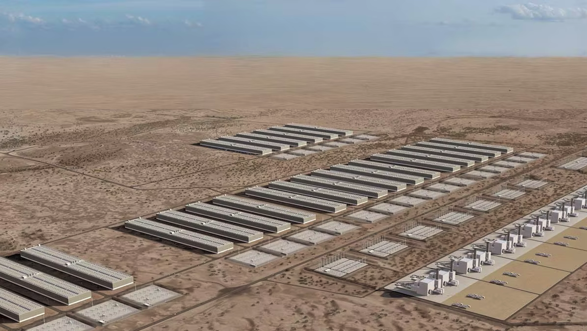 Aerial view of large data centers and power plants in a desert landscape, highlighting off-grid construction.