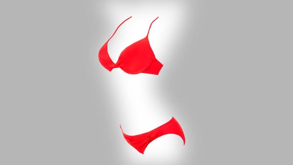 Red bikini set on a grey backdrop, emphasizing issues with AI-generated inappropriate content.