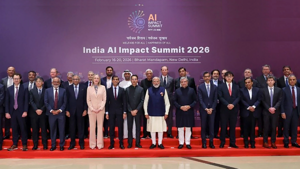 Officials and leaders stand together at the India AI Impact Summit 2026 in New Delhi.