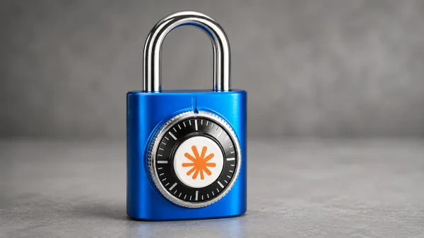 Close-up of a shiny blue padlock, symbolizing security, with a black dial and orange design.